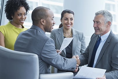 group of businesspeople shaking hands